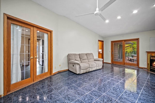 living area featuring french doors, lofted ceiling, baseboards, recessed lighting, and a ceiling fan