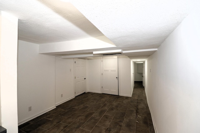 238 Lincoln St, Mankato, MN 56001 - finished basement featuring baseboards and a textured ceiling