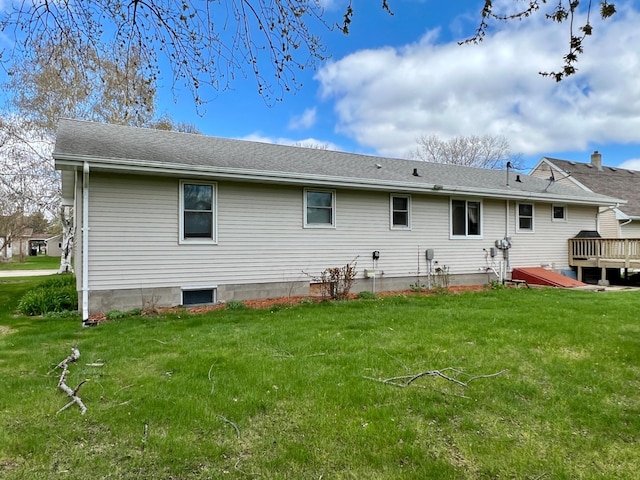 1207 3rd Ave S, Wheaton, MN 56296 - back of property with a lawn and roof with shingles
