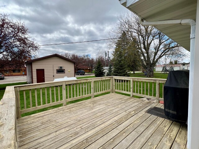 1207 3rd Ave S, Wheaton, MN 56296 - deck featuring a yard and area for grilling