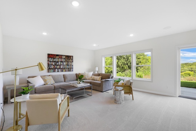 carpeted living room with recessed lighting and a wealth of natural light