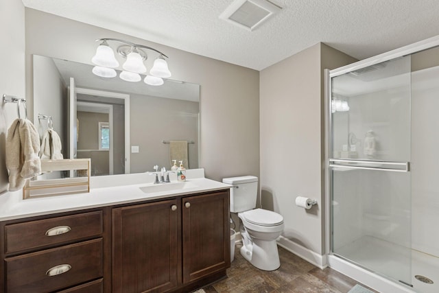 6573 Bridle Path, Corcoran, MN 55340 - full bath featuring a shower stall, toilet, vanity, baseboards, and a textured ceiling