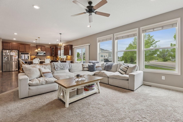 6573 Bridle Path, Corcoran, MN 55340 - living room with recessed lighting, carpet floors, a ceiling fan, and baseboards