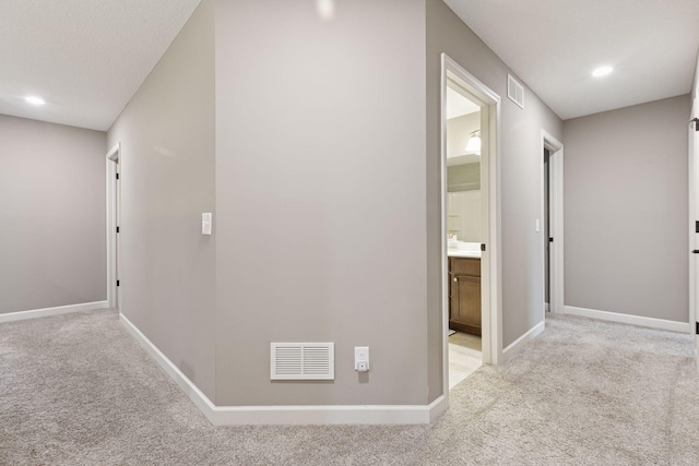 6573 Bridle Path, Corcoran, MN 55340 - corridor featuring carpet flooring, baseboards, and recessed lighting