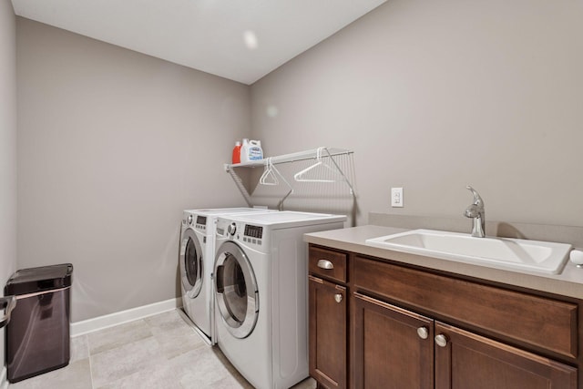 6573 Bridle Path, Corcoran, MN 55340 - laundry room with independent washer and dryer, cabinet space, and baseboards