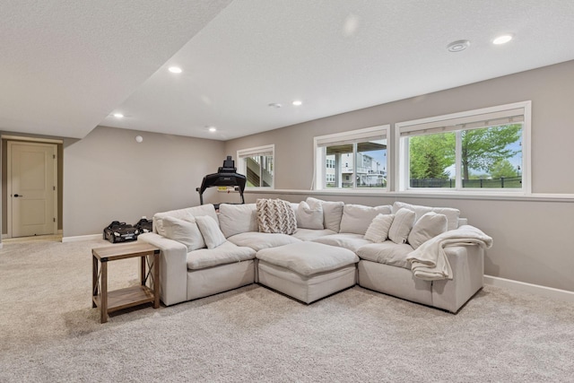 6573 Bridle Path, Corcoran, MN 55340 - living area featuring light carpet, baseboards, recessed lighting, and a textured ceiling