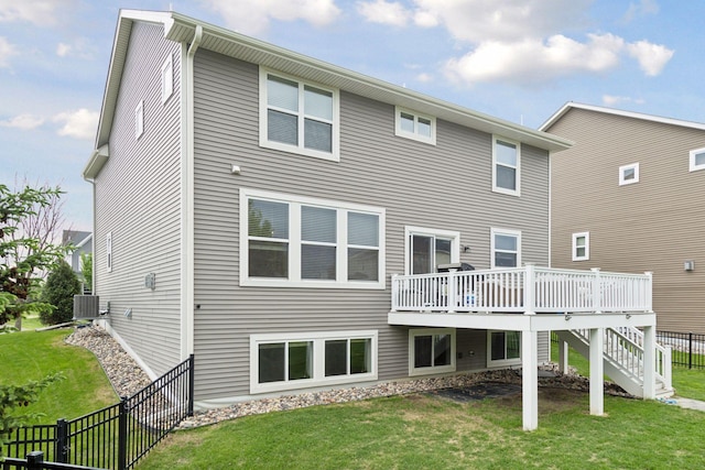 6573 Bridle Path, Corcoran, MN 55340 - rear view of property with a deck, stairs, and central AC