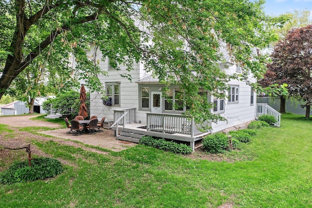 52905 Deerwood Ave, Rush City, MN 55069 - back of house featuring a yard and a deck