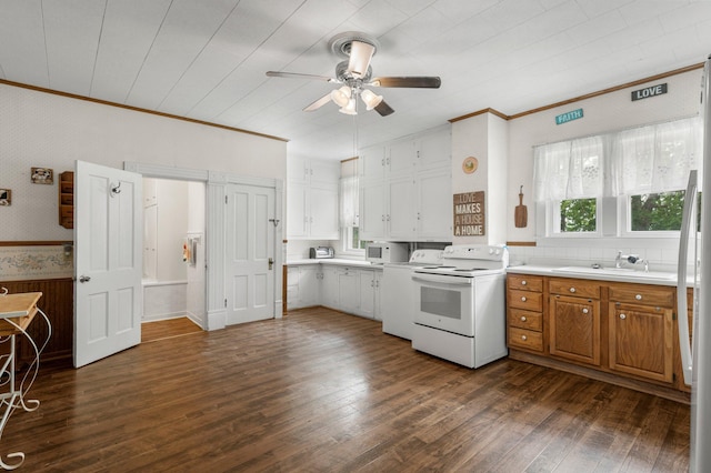 52905 Deerwood Ave, Rush City, MN 55069 - kitchen with white range with electric stovetop, a sink, a ceiling fan, wallpapered walls, and light countertops