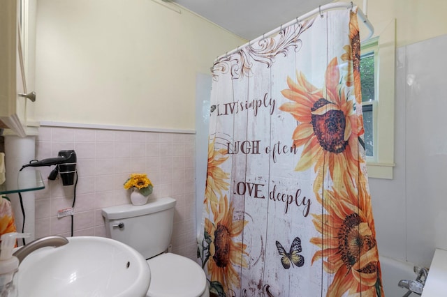 52905 Deerwood Ave, Rush City, MN 55069 - full bathroom with a sink, tile walls, and toilet