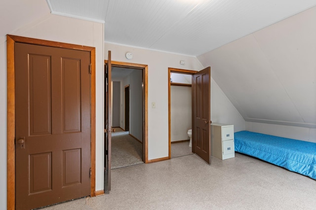 52905 Deerwood Ave, Rush City, MN 55069 - unfurnished bedroom featuring lofted ceiling and baseboards