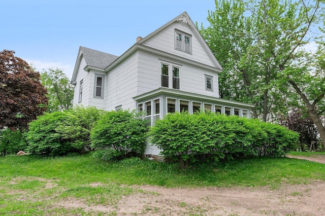 52905 Deerwood Ave, Rush City, MN 55069 - view of side of home with a chimney