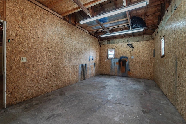 interior space with a garage and concrete flooring