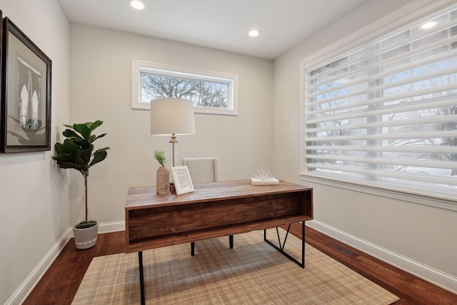 office space featuring baseboards, recessed lighting, and wood finished floors