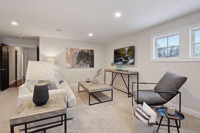 living room with baseboards and recessed lighting