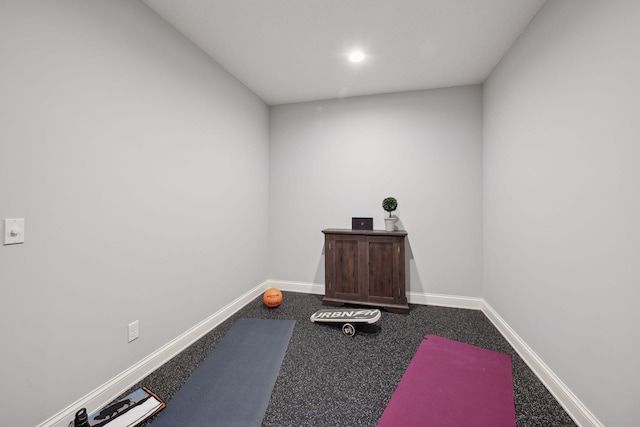 workout room with baseboards and recessed lighting