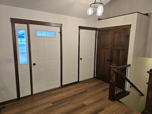 10815 190th Ln NW, Elk River, MN 55330 - foyer featuring dark wood-style flooring