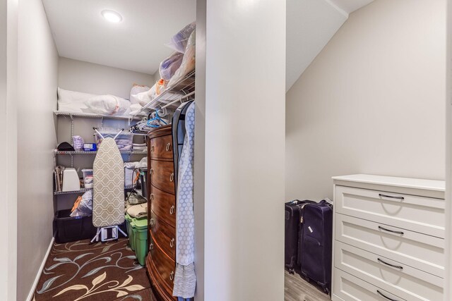 spacious closet with wood finished floors