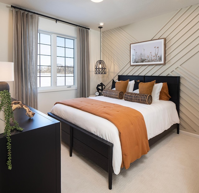 bedroom with light carpet