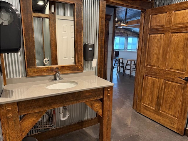 bathroom featuring vanity and concrete floors