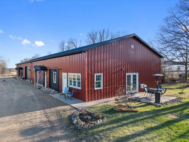 view of outbuilding featuring french doors