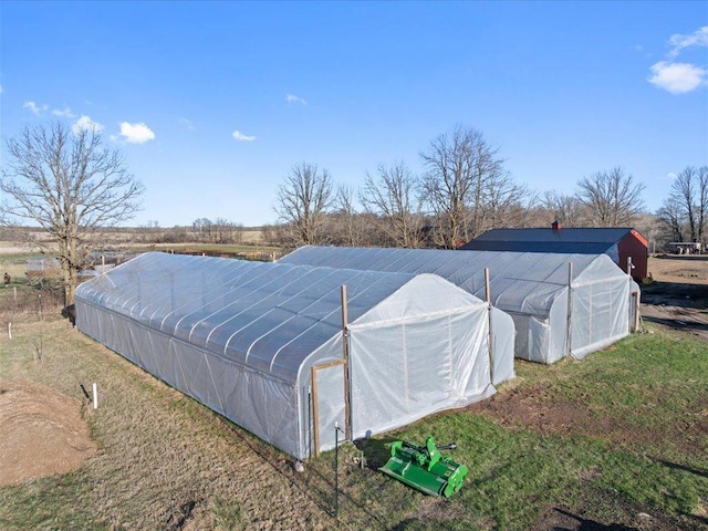 view of yard with an exterior structure and an outdoor structure