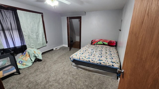 1110 Oakland Ave, Austin, MN 55912 - carpeted bedroom with ceiling fan and baseboards