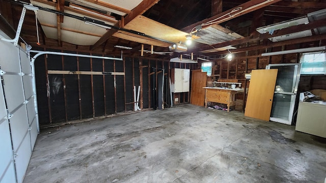 1110 Oakland Ave, Austin, MN 55912 - garage featuring a garage door opener