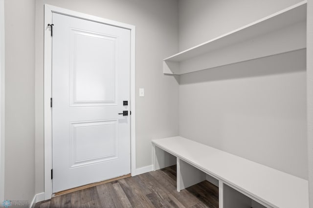 mudroom with baseboards and dark wood finished floors