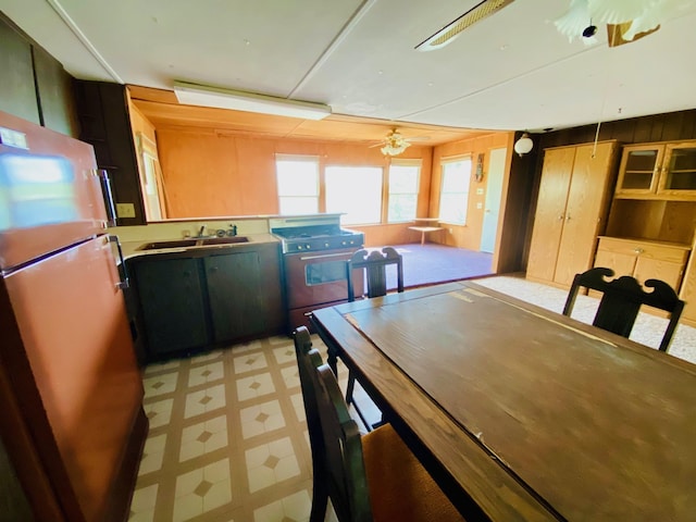 9199 County Road Y, Wascott, WI 54838 - dining space featuring light floors and wooden walls