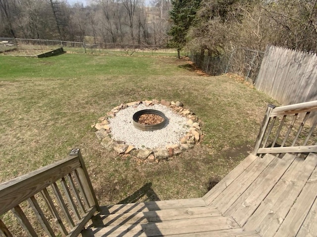 view of yard featuring a deck and fence