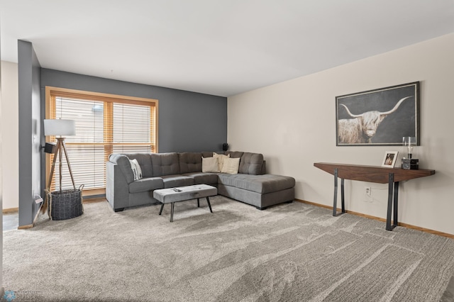 living area with carpet floors and baseboards