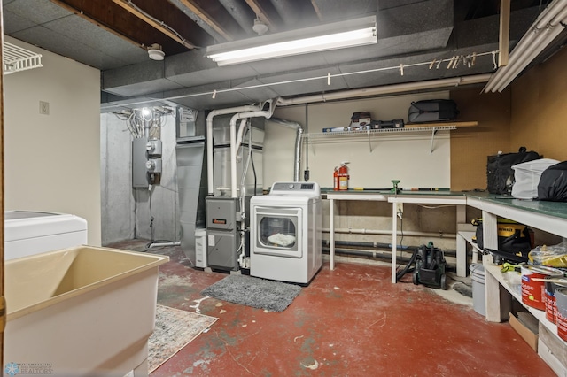 unfinished below grade area featuring a sink and heating unit