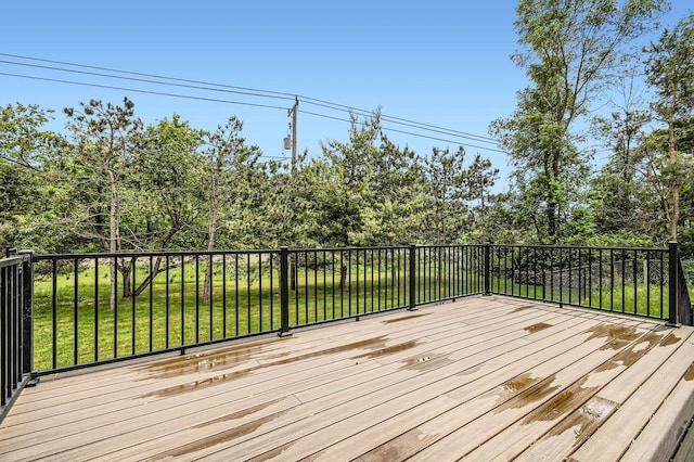 1877 Quasar Ave S, Lake Saint Croix Beach, MN 55043 - wooden deck with a yard and view of scattered trees