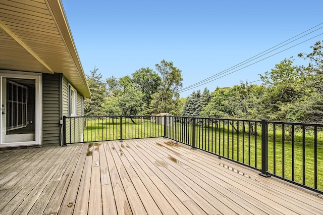 1877 Quasar Ave S, Lake Saint Croix Beach, MN 55043 - wooden deck with a yard and view of wooded area
