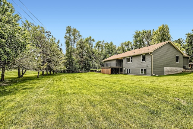 1877 Quasar Ave S, Lake Saint Croix Beach, MN 55043 - view of grassy yard featuring a wooden deck