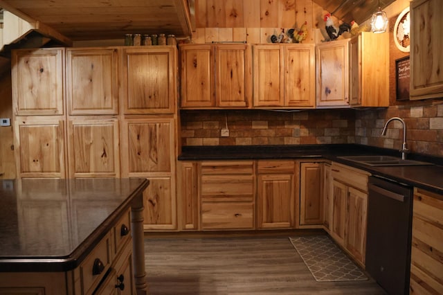 N8690 Island Lake Rd, Casey, WI 54801 - kitchen featuring decorative backsplash, dark countertops, black dishwasher, wooden ceiling, and a sink