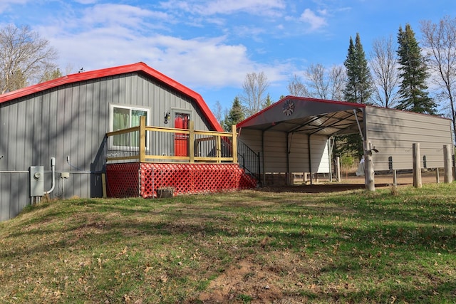 N8690 Island Lake Rd, Casey, WI 54801 - exterior space featuring a yard, a deck, and a carport