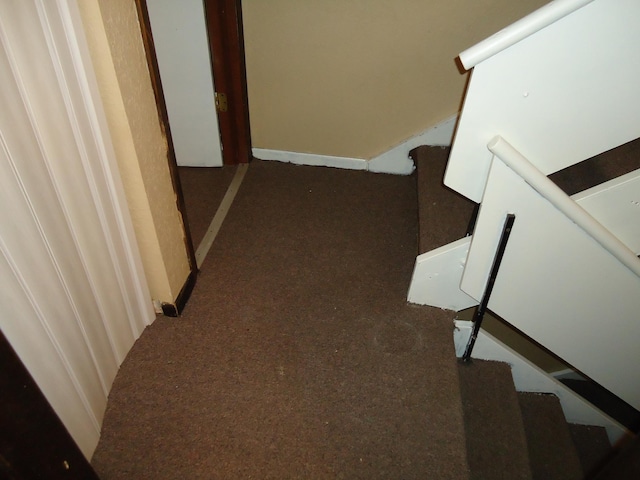hall featuring carpet