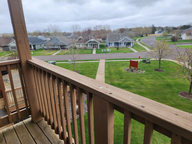 2155 6th Ln SE Unit 212, Cambridge, MN 55008 - deck featuring a residential view and a yard