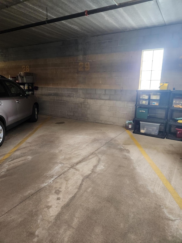 2155 6th Ln SE Unit 212, Cambridge, MN 55008 - parking garage with concrete block wall
