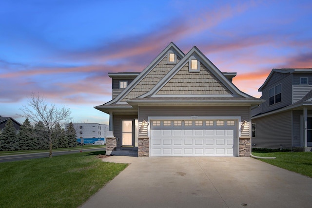1501 Praha St SE, New Prague, MN 56071 - craftsman-style house with concrete driveway, a yard, and stone siding