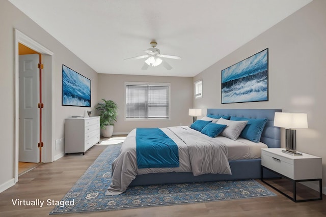 1501 Praha St SE, New Prague, MN 56071 - bedroom with wood finished floors, baseboards, and ceiling fan