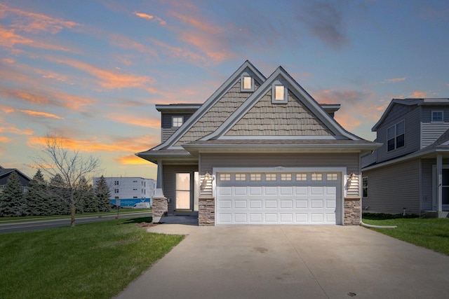 1501 Praha St SE, New Prague, MN 56071 - craftsman house featuring stone siding, driveway, an attached garage, and a front yard