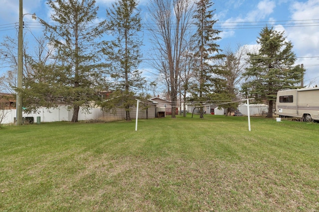 view of yard featuring fence