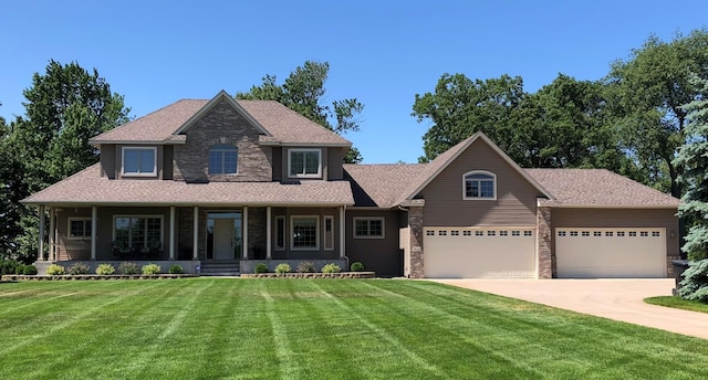 25124 Firefly Ave, Wyoming, MN 55092 - view of front of property with a front yard, a porch, driveway, and an attached garage