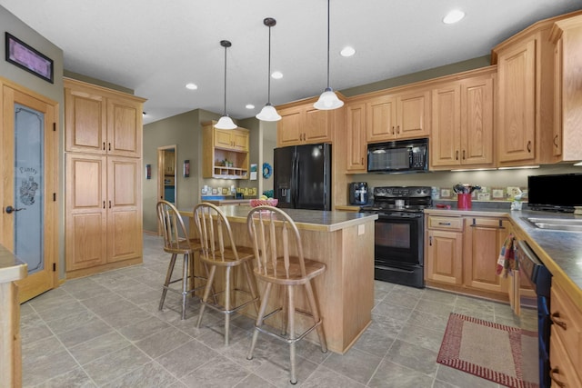 25124 Firefly Ave, Wyoming, MN 55092 - kitchen with black appliances, a kitchen island, a kitchen breakfast bar, recessed lighting, and pendant lighting