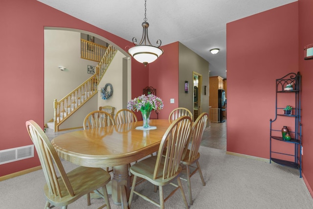25124 Firefly Ave, Wyoming, MN 55092 - dining area with stairway and baseboards
