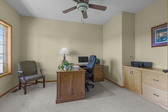 25124 Firefly Ave, Wyoming, MN 55092 - home office with light carpet, baseboards, and ceiling fan