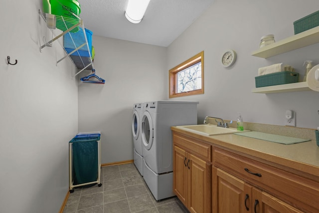 25124 Firefly Ave, Wyoming, MN 55092 - washroom featuring washing machine and clothes dryer, baseboards, light tile patterned flooring, and cabinet space